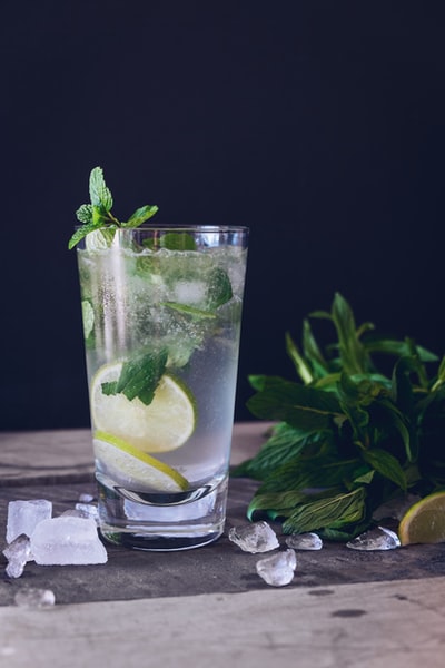 Transparent glass full of water and lemon
